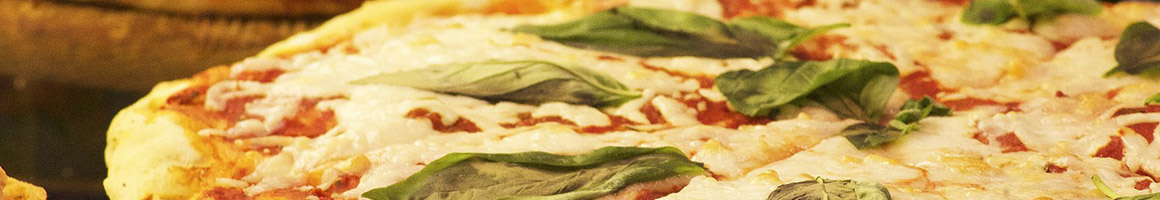 Eating Italian Pizza at Forno Bello Wood Fired Pizza & Italian Cuisine restaurant in DeLand, FL.